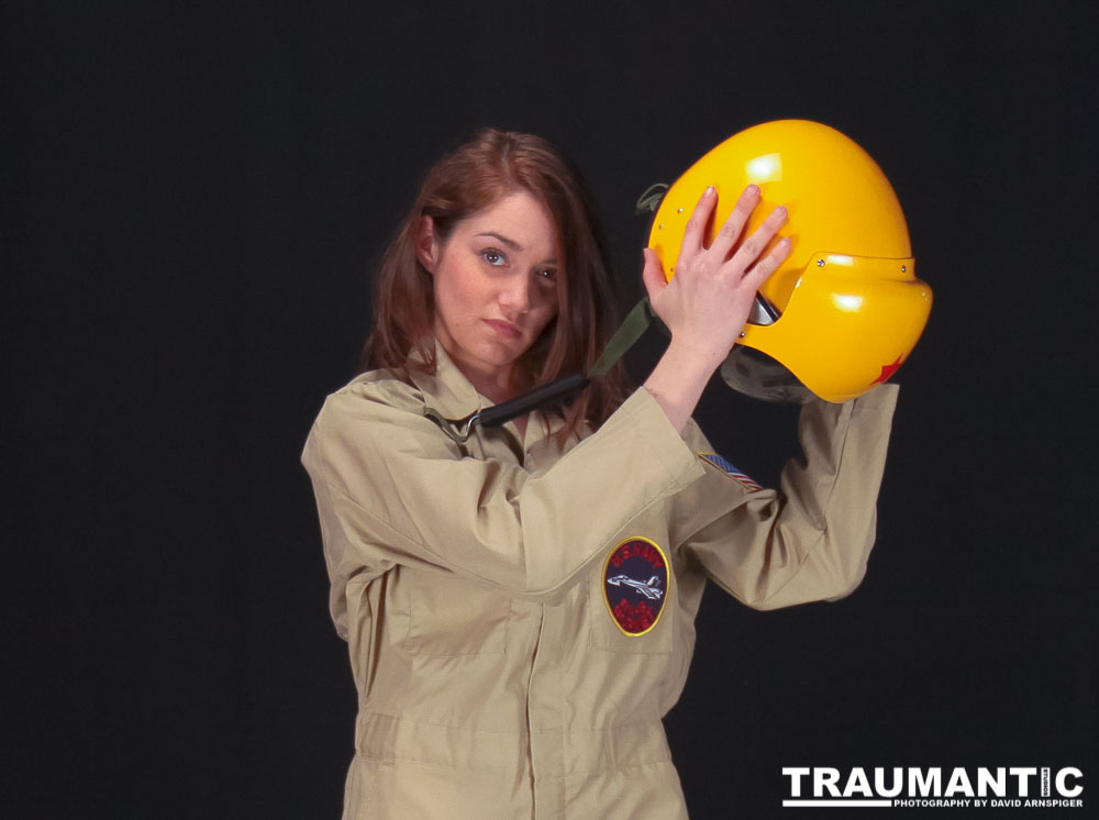 Lindsey was visiting and wanted to shoot, and I had an idea for a pinup based on a pilot's helmet I had recently been given.  So we went to a local military surplus and whipped up a pilot costume and did this shoot.